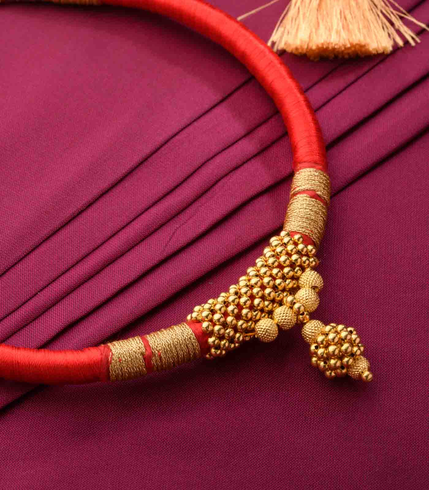 Rust Orange Thread Goph Necklace