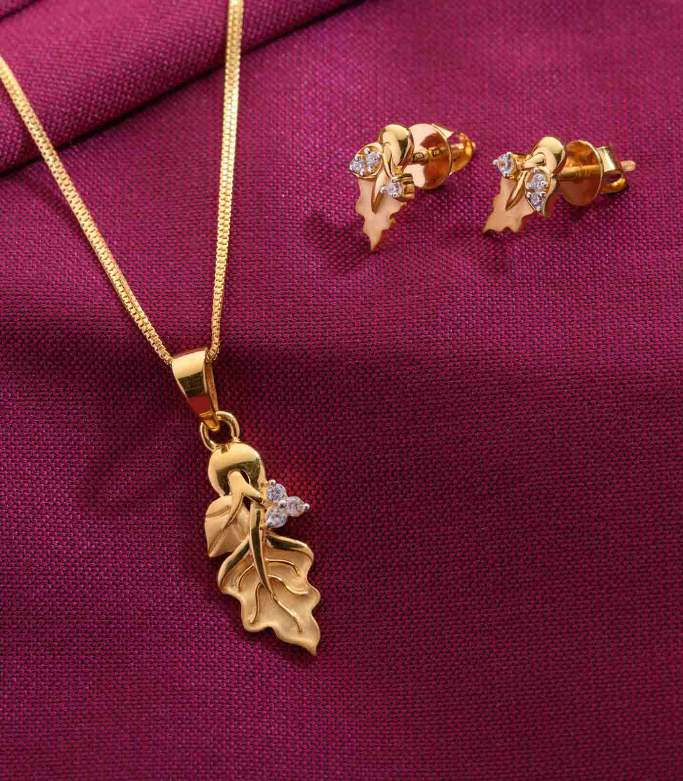 Carved fern pendant set